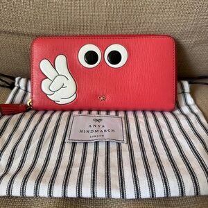 Anya Hindmarch coral colour leather zippy wallet